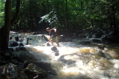 
Mark Anderson crosses at a trail washout while hiking the Appalachian Trail.
 (Photo by Mark Stenerson / The Spokesman-Review)