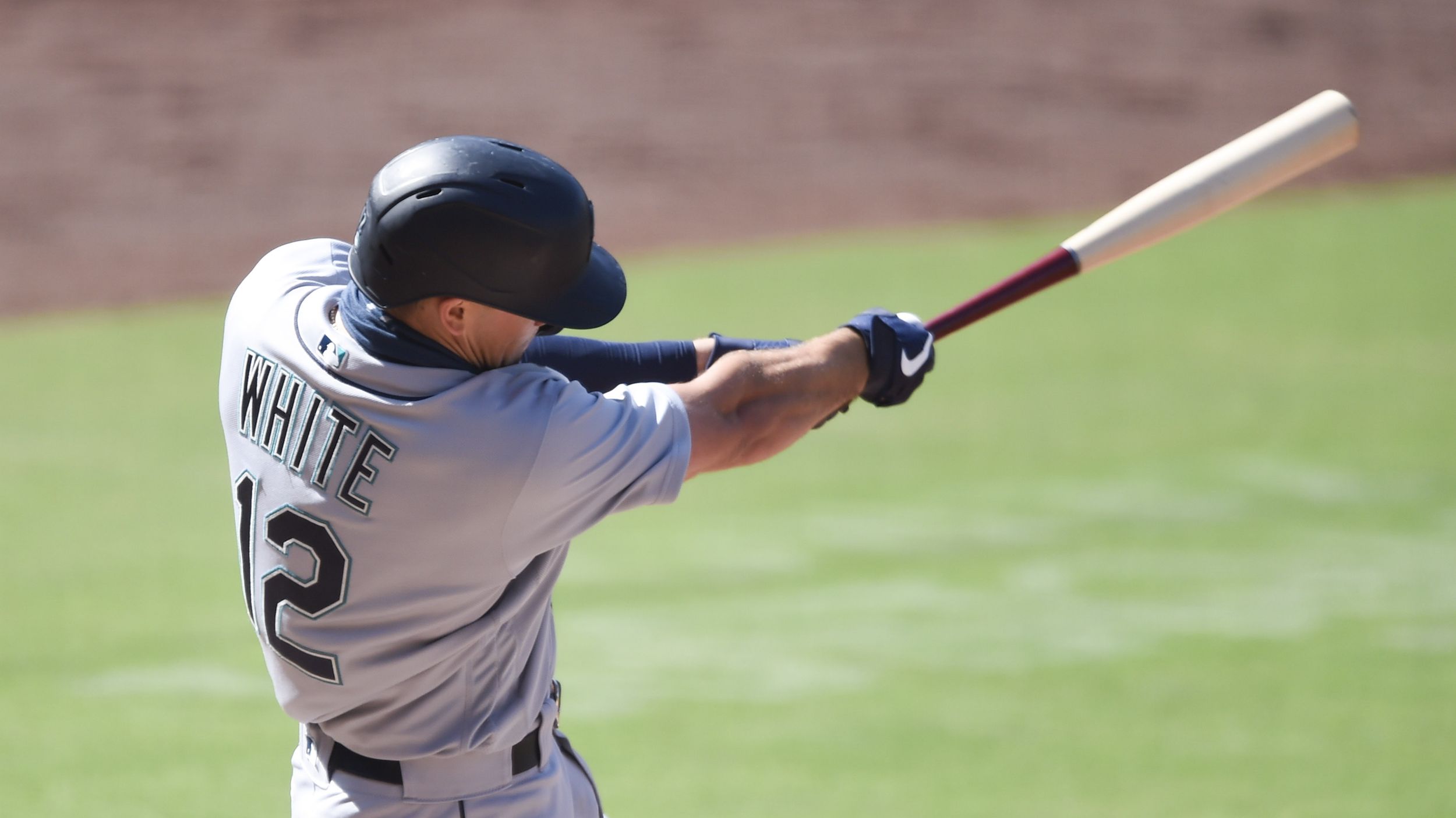 Baseball batter hits the ball hi-res stock photography and images