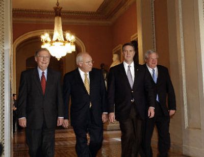 
Outgoing Senate Majority Leader Bill Frist, R-Tenn., second from right, is escorted Thursday by, from left,  Sen. Mitch McConnell, R-Ky., Vice President Dick Cheney and outgoing House Speaker Dennis Hastert, R-Ill., to deliver his farewell speech. 
 (Associated Press / The Spokesman-Review)