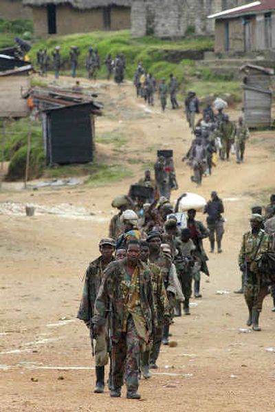 
Soldiers from the Congolese army march Tuesday in Kanyabayonga, Congo. 
 (Associated Press / The Spokesman-Review)