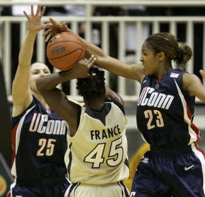 
Purdue's Kalika France has shot blocked by UConn's Maya Moore. Associated Press
 (Associated Press / The Spokesman-Review)