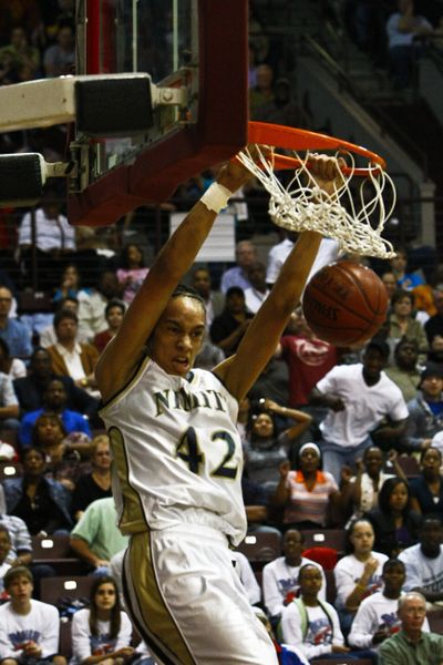 Brittney Griner, a 6-foot-8 high school senior from Houston, electrifies crowds with her dunks.  (Associated Press / The Spokesman-Review)