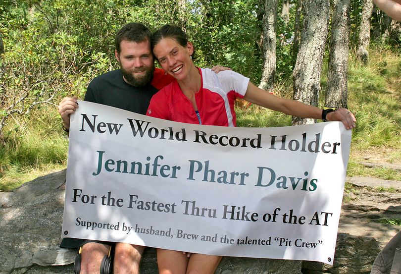 Jennifer Pharr Davis, right, is emotional after the end of her record Appalachian Trail trek. (Associated Press)