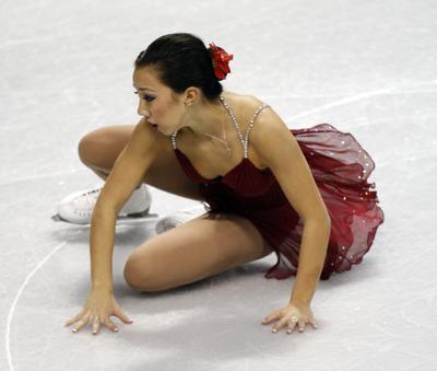 Keauna McLaughlin falls while performing the short program with her partner Rockne Brubaker during the pairs competition at the U.S. figure skating championships in Spokane, Wash., Friday, Jan. 15, 2010. (Rick Bowmer / Associated Press)