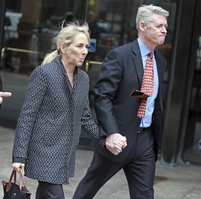 Elisabeth Kimmel, a 54-year-old Las Vegas resident whose family owned a television station and other media properties in San Diego before selling them off in 2017, leaves the federal courthouse after a hearing associated with the college admissions bribery scandal, Friday, March 29, 2019 in Boston. Kimmel is accused of using bribes to get her daughter into Georgetown as a tennis recruit and her son into USC as a track recruit. (Matt Stone / Associated Press)