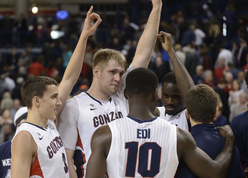 Gonzaga players celebrate Saturday’s 81-50 victory over San Diego. (Colin Mulvany)