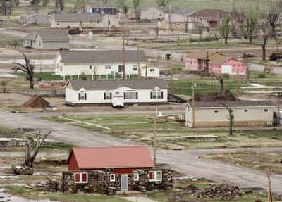 
Houses in various stages of construction dot the Greensburg landscape. The town is slowly rebuilding a year after the tornado.
 (The Spokesman-Review)