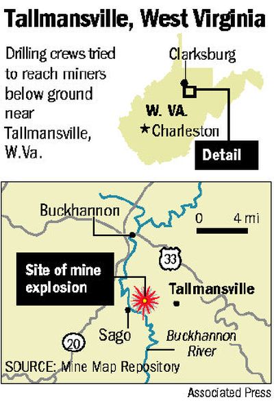 
Darlene Groves, left, and Crystina Neeling celebrate after being told that 12 of the miners were alive. In the end, there was only one survivor. 
 (Associated Press / The Spokesman-Review)