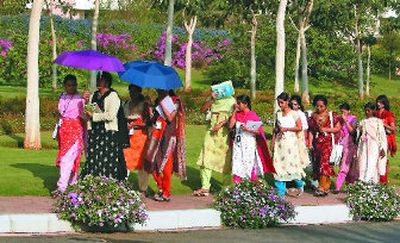 
Employees walk to their classes earlier this year at the training center of Infosys Technologies' sprawling corporate campus in Mysore, India. 
 (Associated Press / The Spokesman-Review)