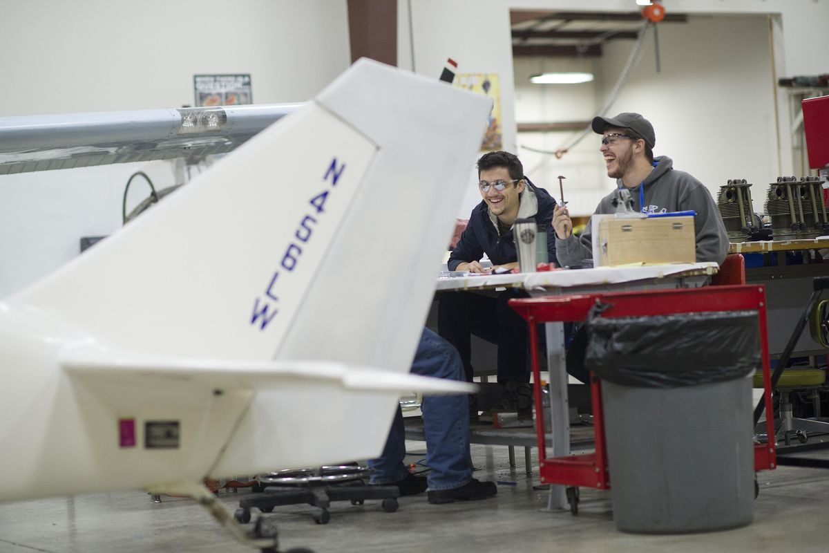 Student Nathaniel Hill, left, jokes with classmate Aaron Vigilante in a Spokane Community College aviation maintenance program hangar at Felts Field on Jan. 28. The program recently received a small, experimental airplane, which will expand the students’ hands-on experience. (Tyler Tjomsland / The Spokesman-Review)