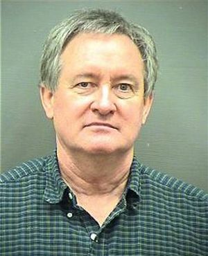 This Sunday, Dec. 23, 2012 booking photo provided by the Alexandria, Va. Police Department shows Idaho U.S. Sen. Michael Crapo. Crapo was arrested early Sunday morning, Dec. 23, 2012 and charged with driving under the influence in a Washington, D.C., suburb, authorities said. (AP/Alexandria Police Department)
