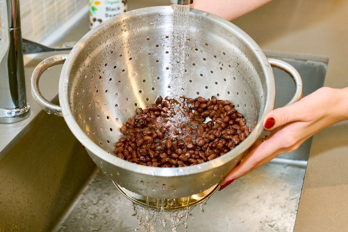 Rinsing canned beans reduces the amount of sodium they'll contribute to a recipe.   (Peggy Cormary for The Washington Post/Food styling by Nicola Justine Davis for The Washington Post)
