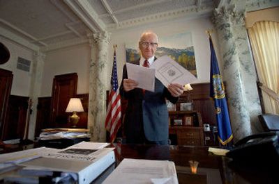 
Idaho Lt. Gov. Mark Ricks looks over some papers at Gov. Jim Risch's desk inside the governor's office  Thursday. 
 (Associated Press / The Spokesman-Review)