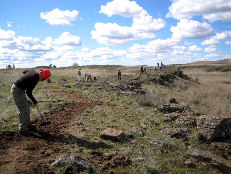 Volunteers work in 2016 to build a new trail across the BLM's Fishtrap Lake recreation area. (Lynn Smith)