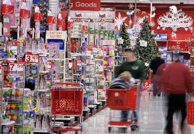 
Shoppers use a newly-opened Target store near Royersford, Pa., on Monday. Discount retailer Target Corp. said Tuesday its third-quarter profit rose 16 percent, beating analyst expectations as its sales rose 11 percent. 
 (Associated Press / The Spokesman-Review)