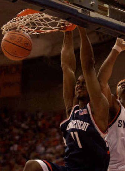 
Connecticut's Hilton Armstrong throws down a dunk in the Huskies' victory over Syracuse.
 (Associated Press / The Spokesman-Review)