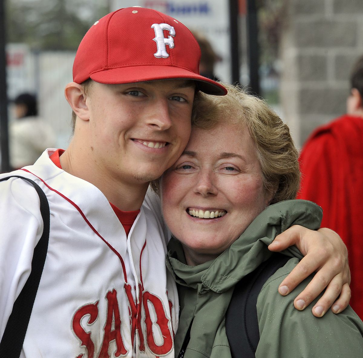Former Ferris athlete Ben Goodwin hugs his mom, and biggest cheerleader, Mary Goodwin. (Dan Pelle)