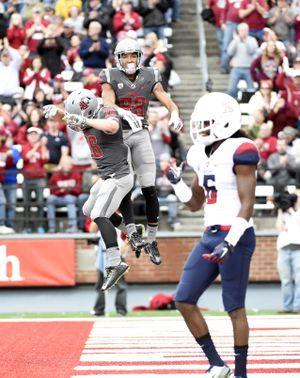 WSU receiver Isiah Myers reacts after scoring a touchdown against Arizona during the first half of a college football game on Saturday, October 25, 2014, at Martin Stadium in Pullman, Wash. (Tyler Tjomsland / The Spokesman-Review)
