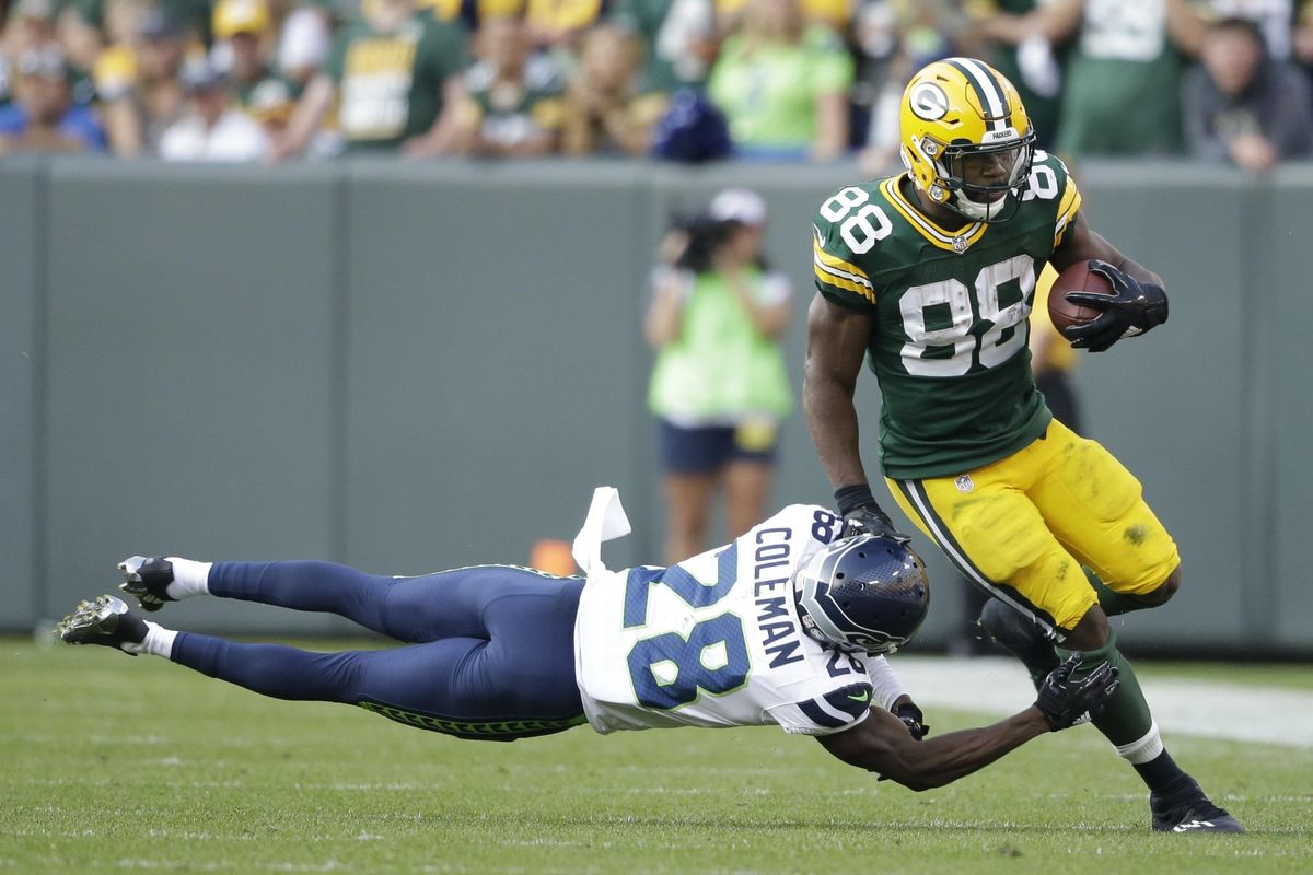 Ty Montgomery of the Packers gets away from Seattle’s Justin Coleman during the second half of an NFL football game Sunday, Sept. 10, 2017, in Green Bay, Wis. (Jeffrey Phelps / Associated Press)