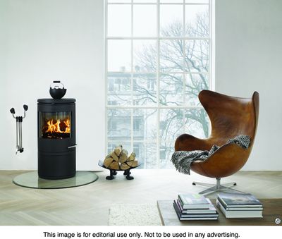 By installing a high-performance wood stove, environmentally conscious homeowners can add aesthetic appeal to their homes while helping the environment and saving money.  (Metro Creative)