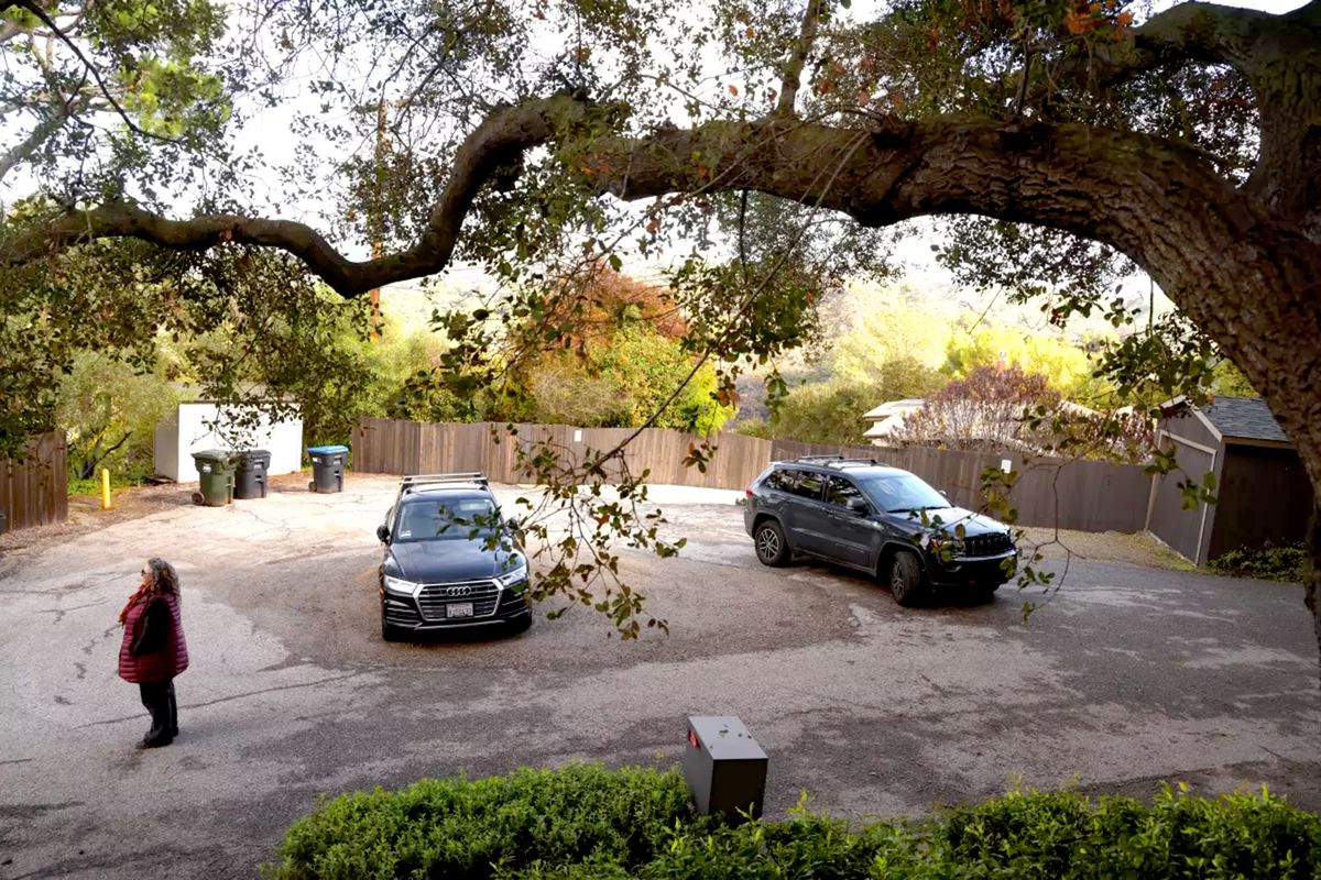 Connie Najah stands on a portion of Peak Trail that was at one time considered a public temporary refuge area during fires in Topanga.   (Genaro Molina/Los Angeles Times/TNS)