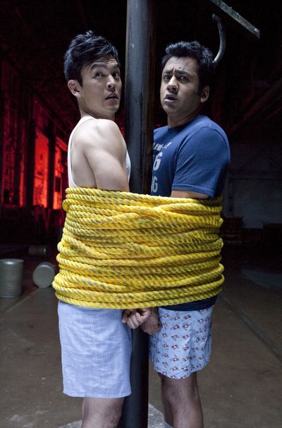 John Cho, left, and Kal Penn are shown in a scene from “A Very Harold & Kumar 3D Christmas.”