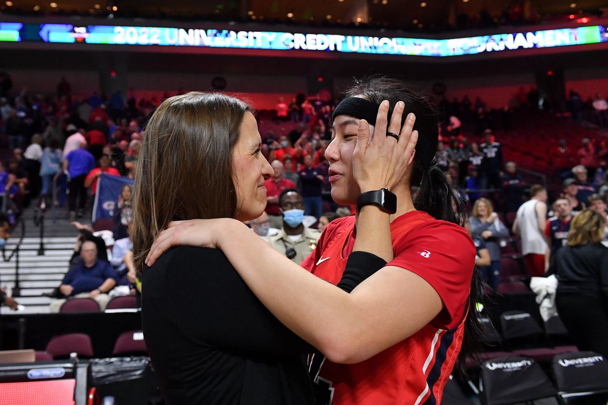 Gonzaga coach Lisa Fortier embraces guard Kaylynne Truong on March 8 in Las Vegas.  (Tyler Tjomsland/The Spokesman-Review)
