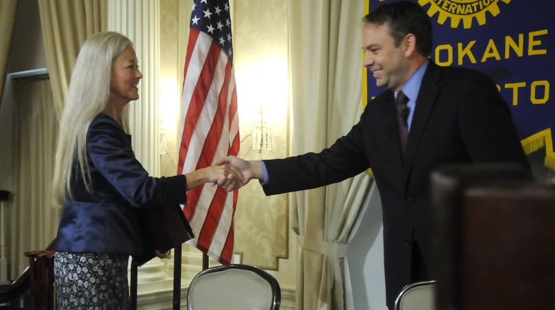 Spokane Mayor Mary Verner and her election opponent, David Condon, shake hands after a debate at a downtown Rotary Club debate on Thursday, Sept. 9, 2011 at the Spokane Athletic Club. (Dan Pelle)