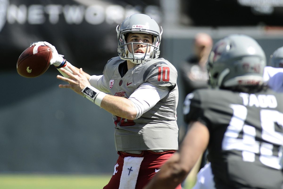 Washington State Cougars quarterback Trey Tinsley (10) drops back for a pass during the Crimson and Gray football game on Saturday, April 21, 2018 at Albi Stadium. (James Snook / SR)