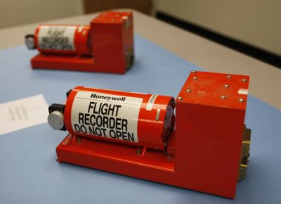 The flight recorders from Thursday’s crash of Continental Connection Flight 3407 are shown to the media  Friday.  (Associated Press / The Spokesman-Review)