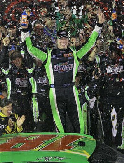 Kyle Busch soaks up the moment after Saturday's Coke Zero 400 win gave him six victories for the Sprint Cup Series season. Associated Press
 (Associated Press / The Spokesman-Review)