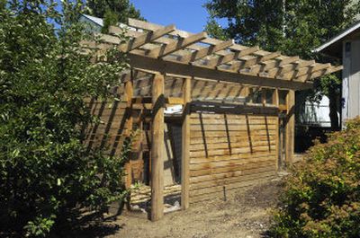 
Tom Angell's chicken coop is designed to blend into his family's west Spokane yard. 
 (COLIN MULVANY The Spokesman-Revew / The Spokesman-Review)