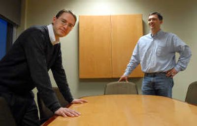 
Dominic Lindauer, left, a Gonzaga law student, has helped Mark Russell obtain patents for technology developed by EnergeticX. Lindauer plans to go into patent and intellectual property work after he passes the bar. 
 (Jesse Tinsley / The Spokesman-Review)