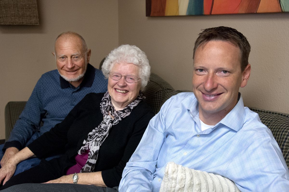 Dentist T.J. Scarborough, right, has gone on six humanitarian trips to the Dominican Republic and India. Freda Willoughby, center, and her husband Lloyd, make homemade 3-inch miniature babies for Scarborough to give to his dental patients on his trips. (Dan Pelle)