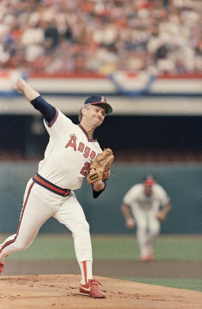 In this Oct. 11, 1986 photo, California Angels starting pitcher Don Sutton pitches against the Boston Red Sox during Game 4 of the American League Championship playoffs at Anaheim Stadium. On June 18, 1986, Sutton pitched a three-hitter for his 300th career victory as the Angels beat the Texas Rangers 5-1. The 41-year-old right-hander became the 19th pitcher in baseball history to win 300 games.  (Associated Press)