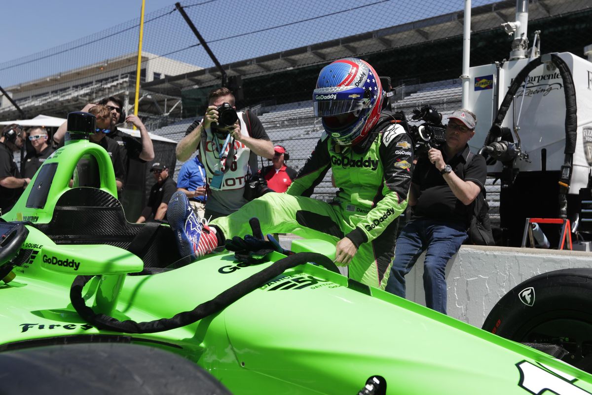 IndyCar driver Danica Patrick climbs into her car to test drive at Indianapolis Motor Speedway in Indianapolis, Tuesday, May 1, 2018. (Michael Conroy / Associated Press)