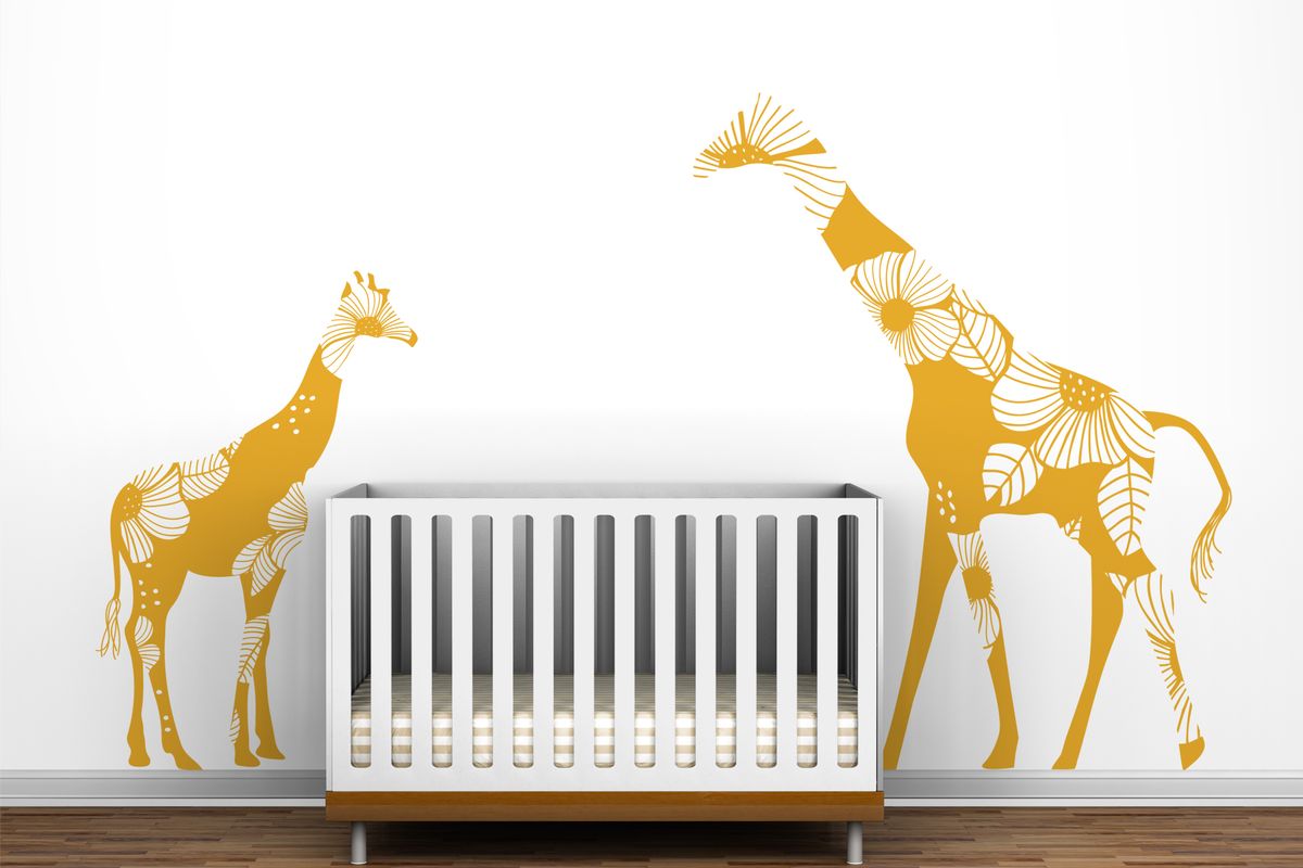 A floral giraffe family decal from Toronto-based LittleLion Studio.