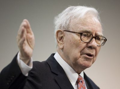 Warren Buffett, pictured in May, joked Wednesday that he had hoped his recent cataract surgery would help him see the recovery signs others have talked about.  (File Associated Press / The Spokesman-Review)