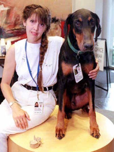 
 Sandra Anderson and her dog Eagle are shown in Detroit in 2000.
 (File/Associated Press / The Spokesman-Review)