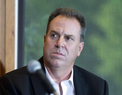 Scott Carter listens as owner Bobby Brett announces him as the new general manager of the Spokane Chiefs hockey team Thursday, Sept. 8, 2016 at the Spokane Arena.  He will replace outgoing manager Tim Speltz.  JESSE TINSLEY jesset@spokesman.com (Jesse Tinsley / The Spokesman-Review)