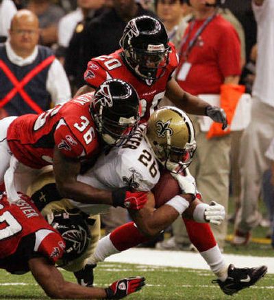 
Deuce McAllister and the Saints took the Falcons  for a ride in Monday night's reopening of the Superdome. 
 (Associated Press / The Spokesman-Review)
