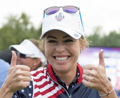 In this Sept. 20, 2015, file photo, Paula Creamer celebrates at the Solheim Cup golf tournament in St. Leon-Rot, southern Germany, after defeating Germany's Sandra Gal. After making the U.S. team for the Solheim Cup six times in a row, Paula Creamer lost her spot. But captain Juli Inkster gave Creamer a reprieve as an alternate, and she'll head into this weekend's tournament looking to find her game again. (Jens Meyer / Associated Press)