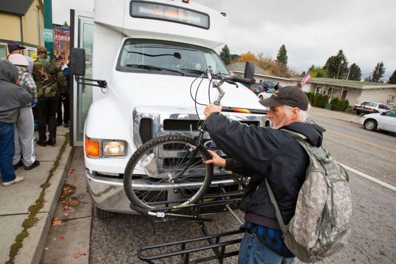 Robert Wayne Parkinson, 56, is shown loading his bicycle onto a CityLink bus in this Coeur d'Alene Press file photo.