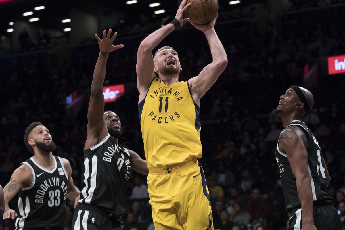 Indiana’s Domantas Sabonis goes to the basket past Brooklyn’s Allen Crabbe (33), DeMarre Carroll (9) and Dante Cunningham in a Feb. 14 game. (Mary Altaffer / Associated Press)