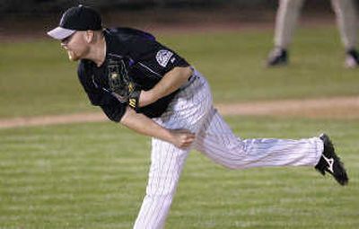 
Colorado pitcher Aaron Cook is one of two Rockies' starters lost to injury. Associated Press
 (Associated Press / The Spokesman-Review)