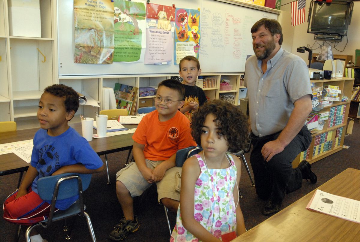 The Spokesman-Review New East Valley Superintendent John Glenewinkel stopped by Megan Lawler’s Trent Elementary summer school kindergarten class on the last day of school July 24. He joined, from left, Daniel, Rodney, Danny and Natalie as they learned about zoo animals. (J. BART RAYNIAK / The Spokesman-Review)