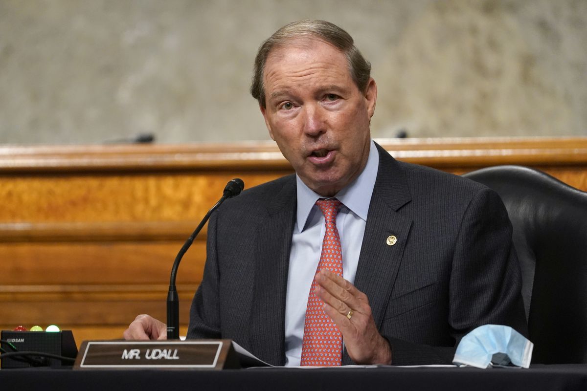FILE - In this Sept. 24, 2020 file photo, Sen. Tom Udall, D-N.M., speaks during a Senate Foreign Relations Committee hearing on Capitol Hill in Washington. Udall is retiring from the Senate, but has emerged as a leading contender to be Interior secretary under President-elect Joe Biden. If chosen, the Democrat would follow in the footsteps of his father, Stewart Udall, a former congressman who led Interior under two Democratic presidents in the 1960s. (Susan Walsh)
