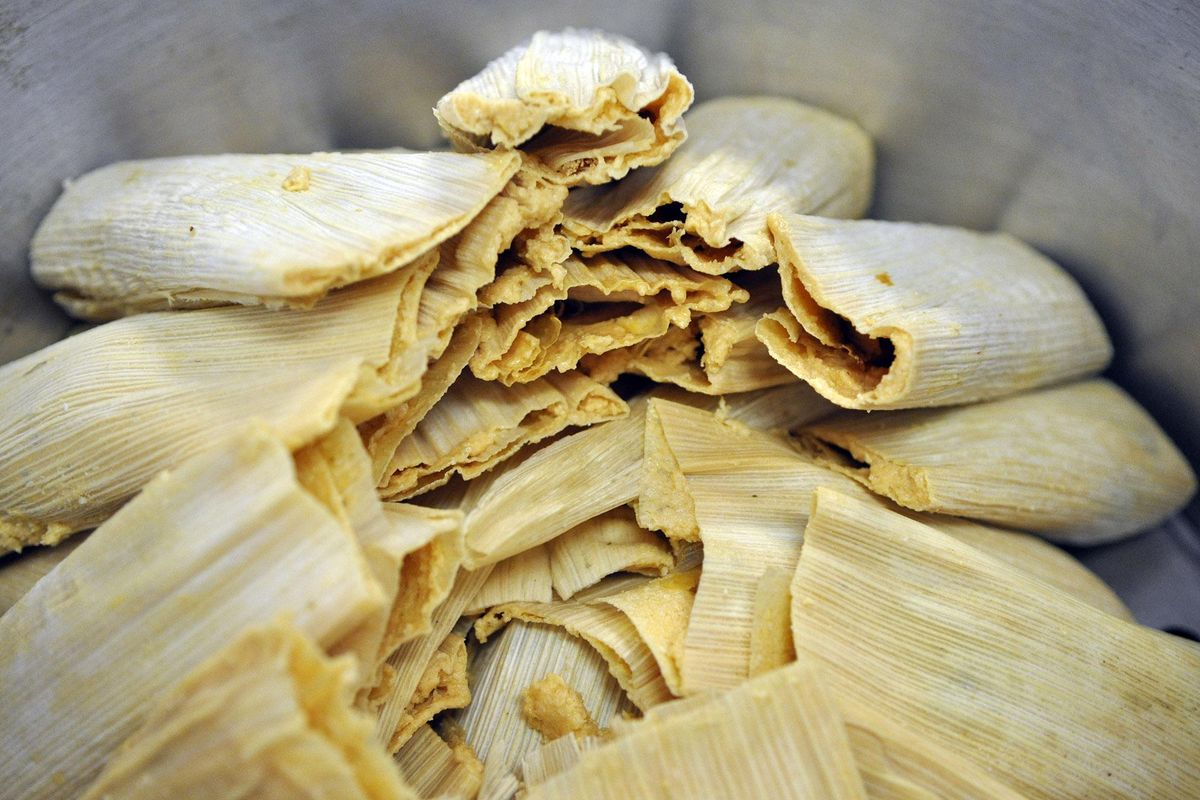 Tamales are stacked in a pot, ready for steaming, at De Leon Foods in Spokane. (Adriana Janovich / The Spokesman-Review)