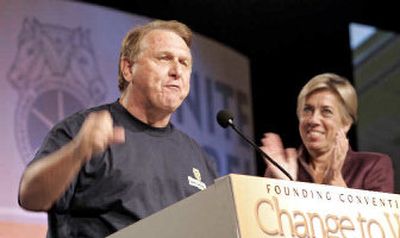 
James P. Hoffa, president of the International Brotherhood of Teamsters stands with Ann Burger, chairman of the 