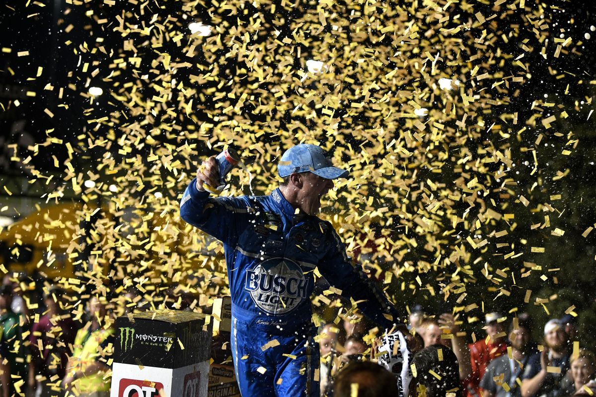 Kevin Harvick celebrates after winning the NASCAR Cup Series auto race at Kansas Speedway on Saturday, May 12, 2018, in Kansas City, Kan. (AP Photo/Ed Zurga) ORG XMIT: KSEZ106 (Ed Zurga / AP)
